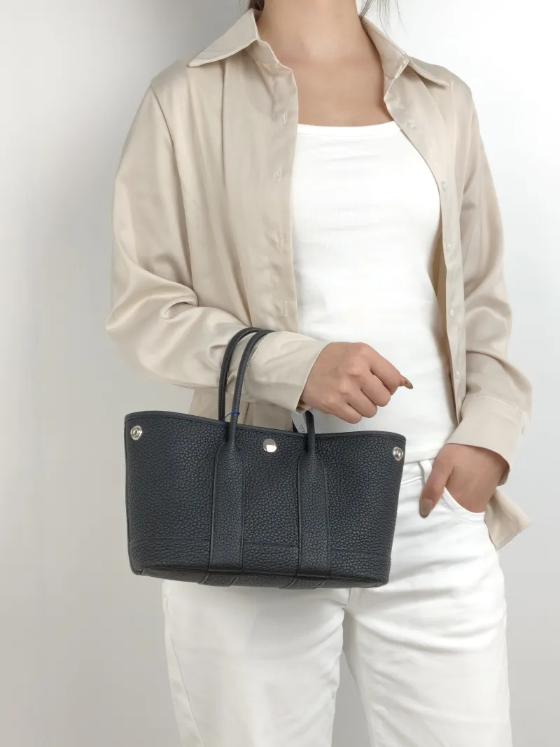 Hermès Top Handle Bag Neo Garden 23 Mini Negonda Calfskin Mini 23 × 10 × 16 cm G — on-model view 2 of 2