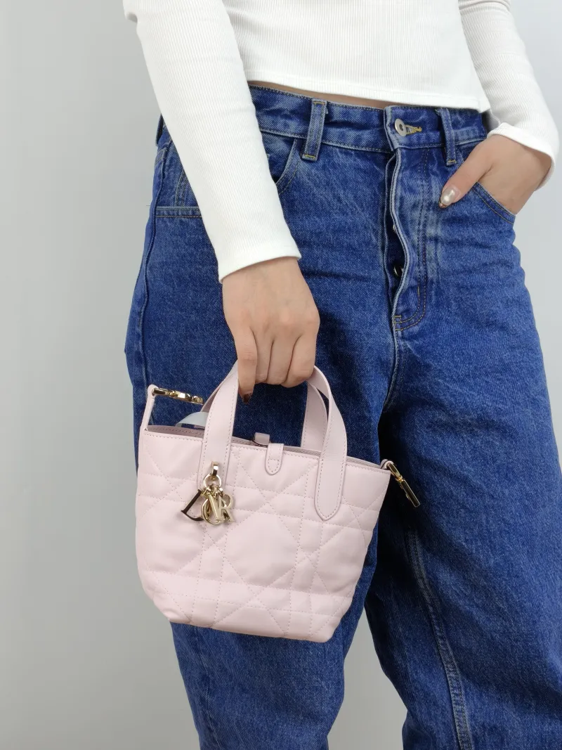 DIOR Top Handle Bag TOUJOURS Edition Pink Calfskin Mini 13 × 12 × 15 cm — on-model view 1 of 2