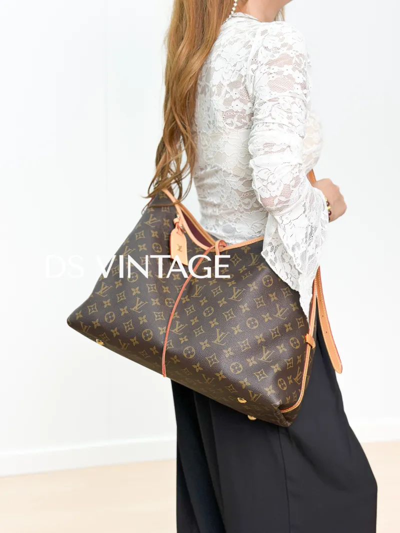 Louis Vuitton Crossbody Bag Carryall Monogram PVC Medium 39 × 15 × 30 cm — on-model view 2 of 6