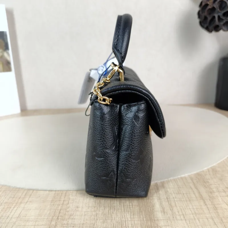 Louis Vuitton Crossbody Bag MADELEINE Black Monogram Empreinte Embossed Calfskin nano 21 × 6 × 12.5 cm — detail view 12 of 14