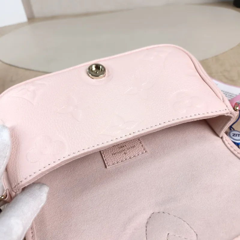 Louis Vuitton Crossbody Bag Diane Baguette Bag Monogram Empreinte Embossed Calfskin nano 19 × 6 × 10.5 cm — detail view 6 of 13