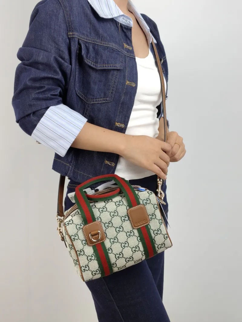 GUCCI Crossbody Bag GG Collection Green Canvas Mini 20 × 13 × 13 cm — on-model view 1 of 2