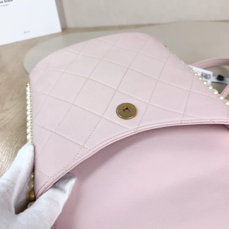 Chanel Crossbody Bag Pearl Crossbody Bag Pink Calfskin One Size 19 × 8 × 19 cm 31 — detail view 1 of 12
