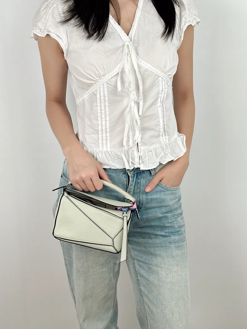 LOEWE Crossbody Bag Puzzle Green Calfskin Mini 18 × 8 × 12.5 cm — on-model view 3 of 3