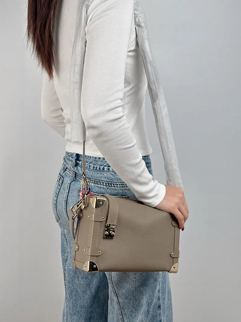 Louis Vuitton Crossbody Bag Side Trunk Box Calfskin Medium 23.5 × 8.5 × 16 cm — on-model view 1 of 3