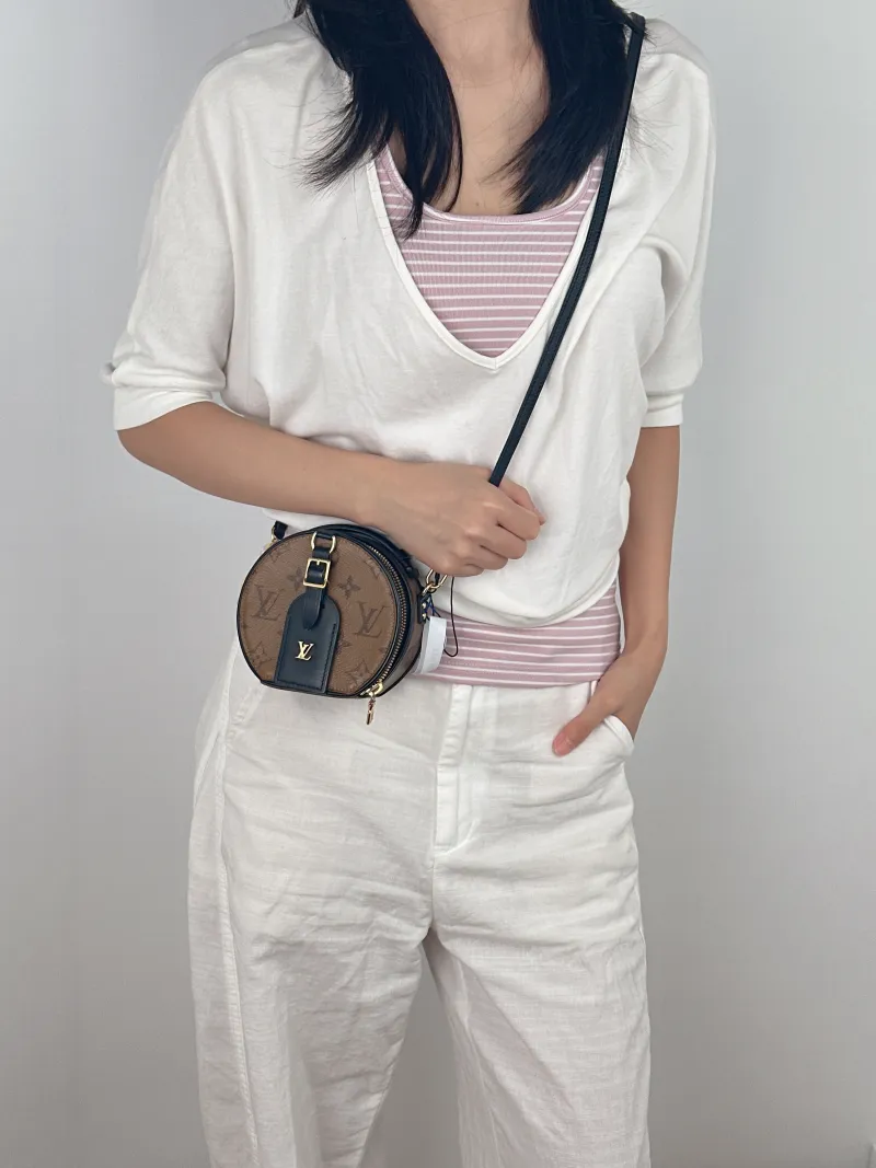 Louis Vuitton Crossbody Bag Mini BOITE CHAPEAU Monogram PVC Mini 13 × 6.5 × 12 cm — on-model view 2 of 3
