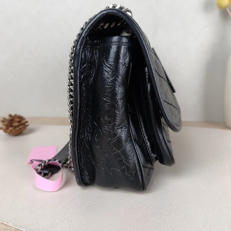 SAINT LAURENT Crossbody Bag Niki Black Waxed Leather Calfskin Small 21 × 7.5 × 16 cm — detail view 11 of 13