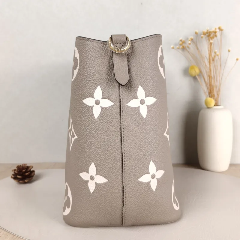 Louis Vuitton Shoulder Bag NÉONOÉ Bucket Bag · White Monogram Empreinte Embossed Calfskin Medium 26 × 17.5 × 26 cm — detail view 12 of 13