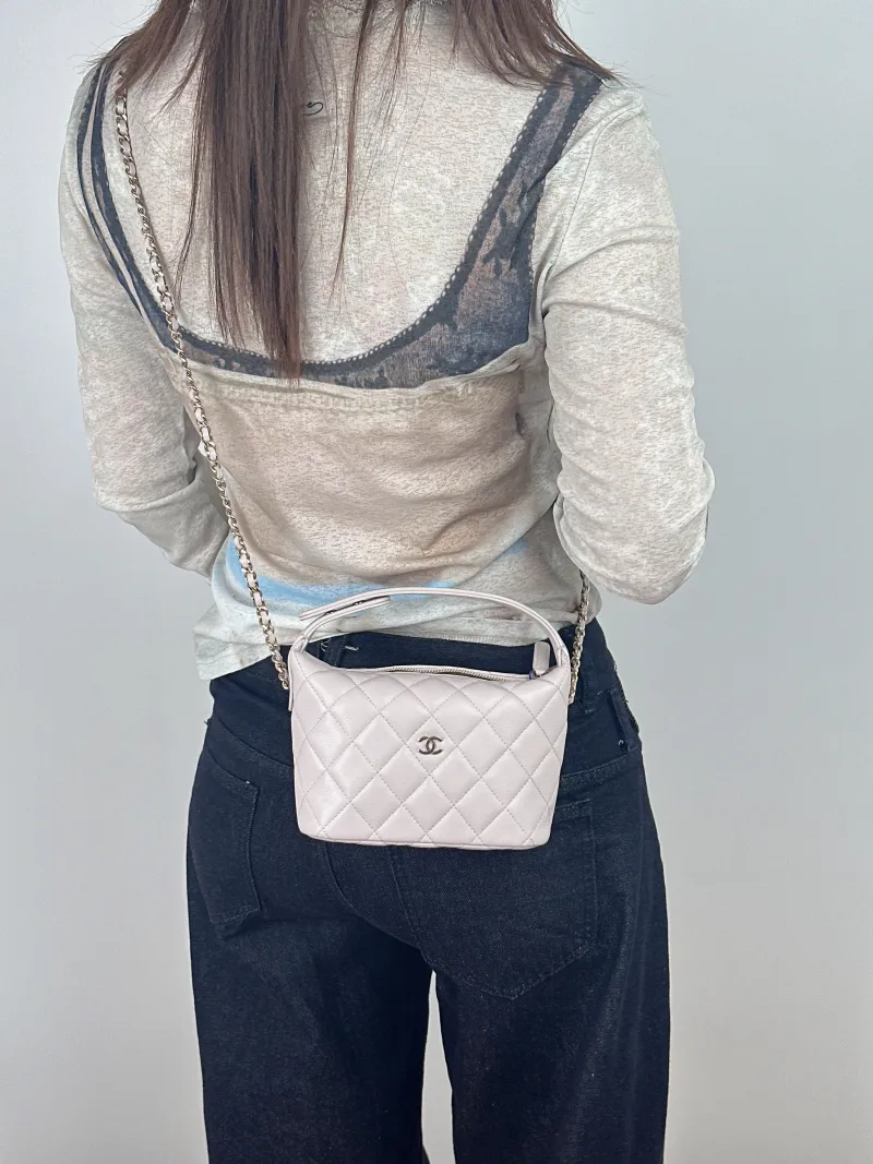 Chanel Crossbody Bag Crossbody Bag Pink Calfskin21.5 × 7.5 × 19 cm — on-model view 1 of 2