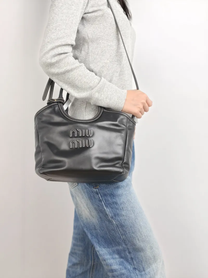 Miumiu Shoulder Bag IVY Tote Shopping Tote Black CC alfskin Small 22 × 12 × 23.5 cm — on-model view 1 of 3