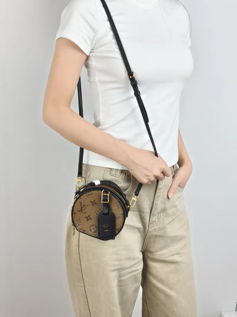 Louis Vuitton Crossbody Bag Mini BOITE CHAPEAU Monogram PVC Mini 13 × 6.5 × 12 cm — on-model view 1 of 3