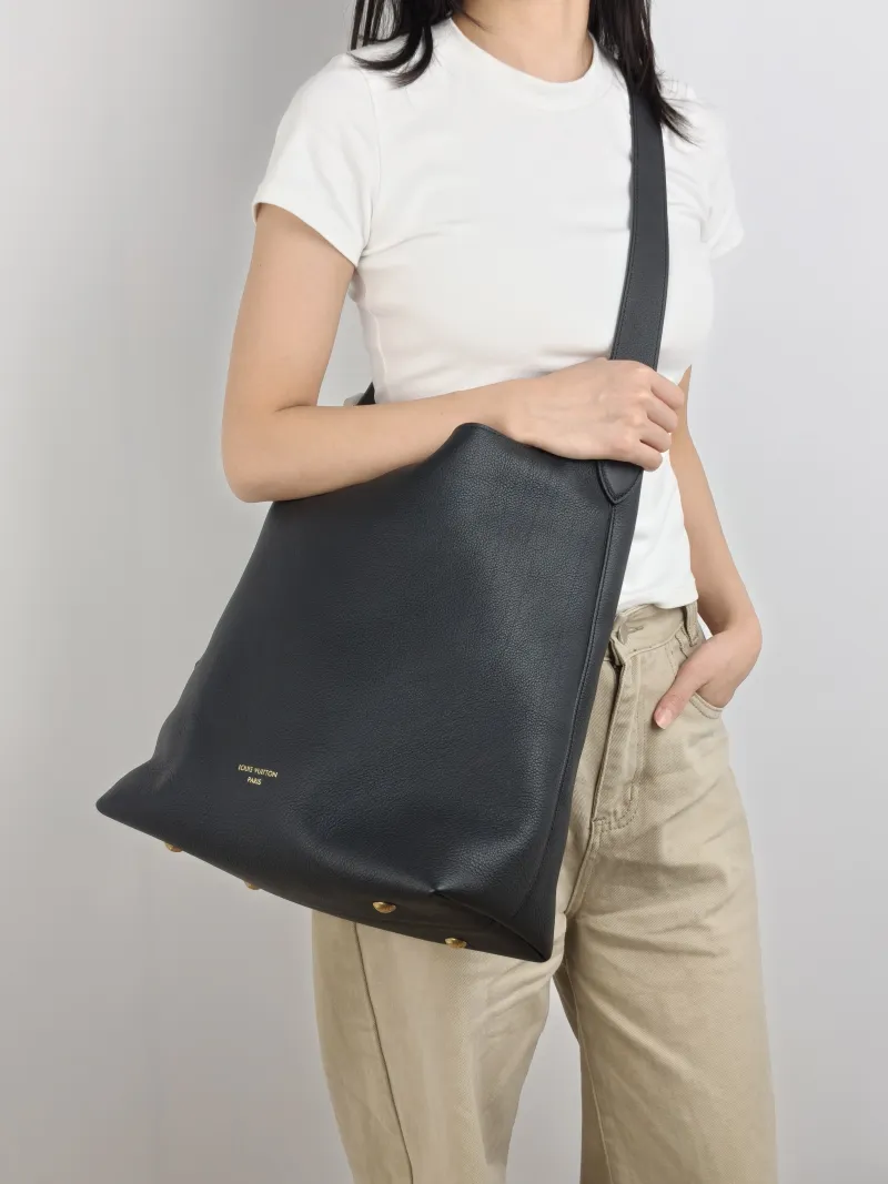 Louis Vuitton Shoulder Bag Low Key Hobo Shoulder Bag Black Calfskin Medium 31 × 18 × 35 cm — on-model view 1 of 2
