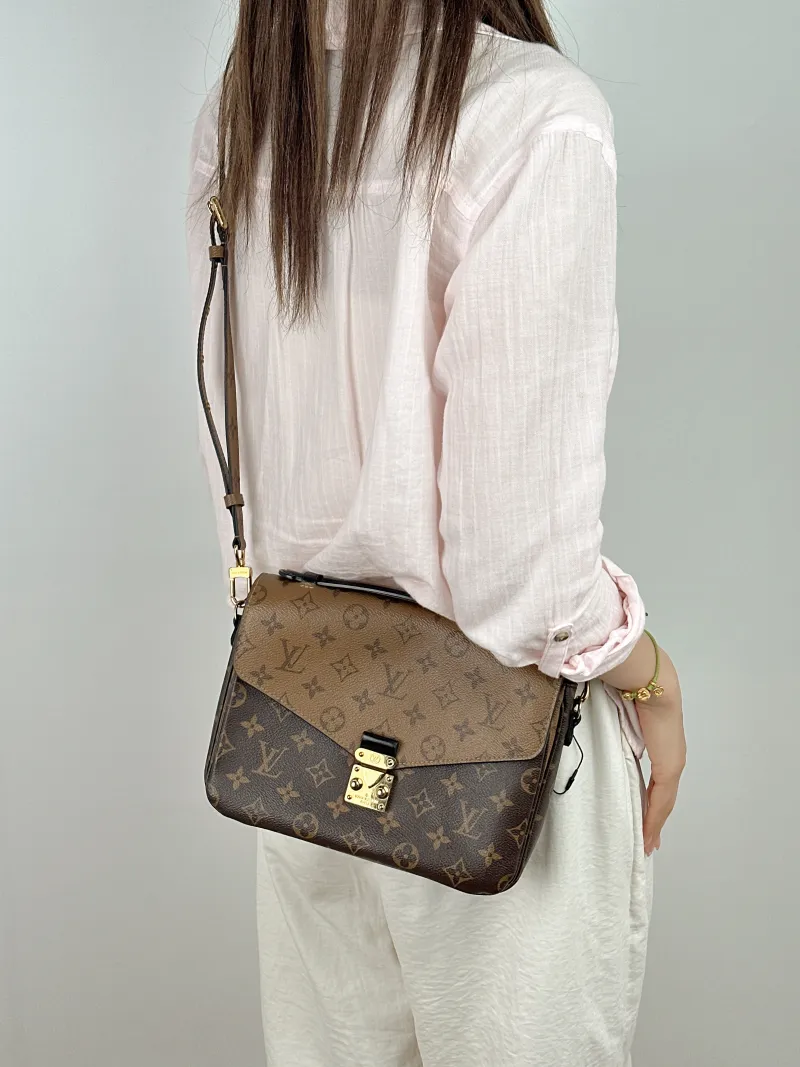 Louis Vuitton Crossbody Bag Pochette Métis Monogram Colorblock PVC Medium 25 × 7 × 19 cm — on-model view 2 of 2