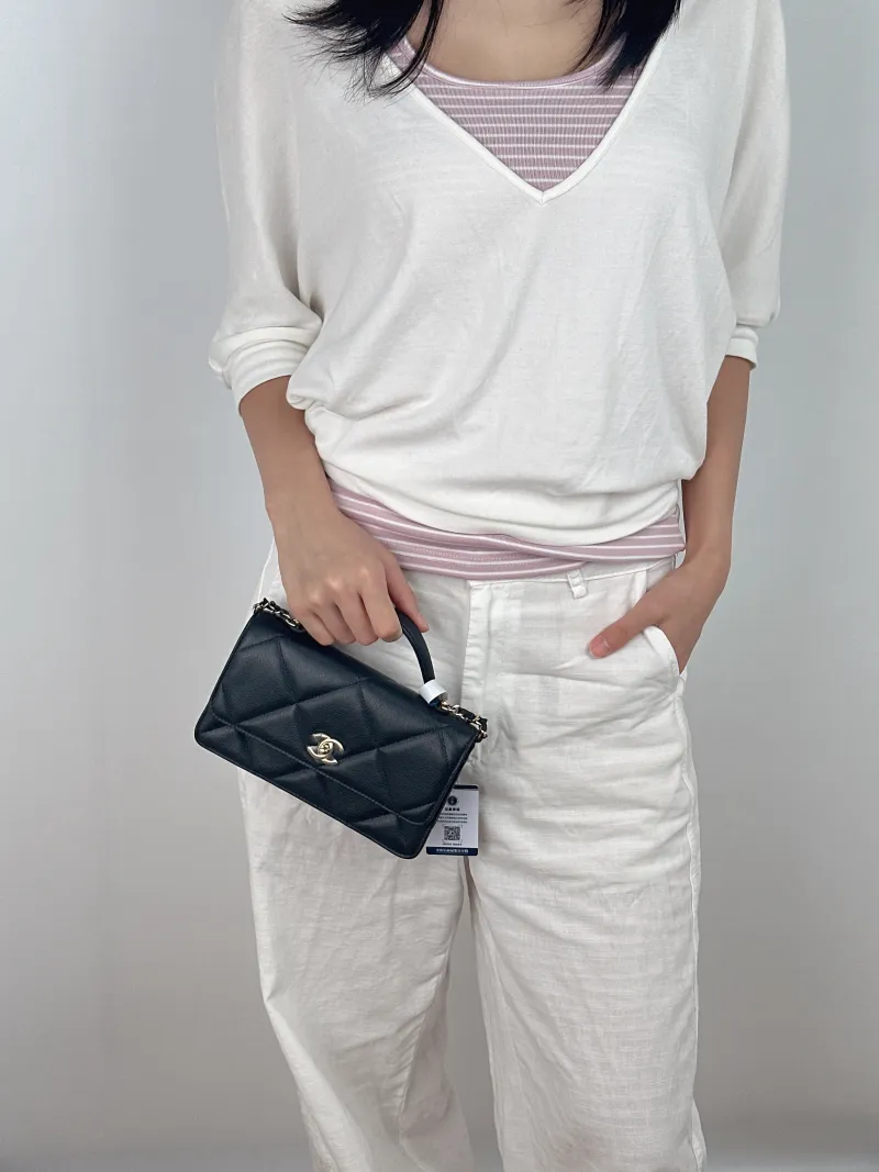 Chanel Crossbody Bag woc Black Grained Calfskin One Size 19.2 × 3.5 × 12.3 cm — on-model view 3 of 3