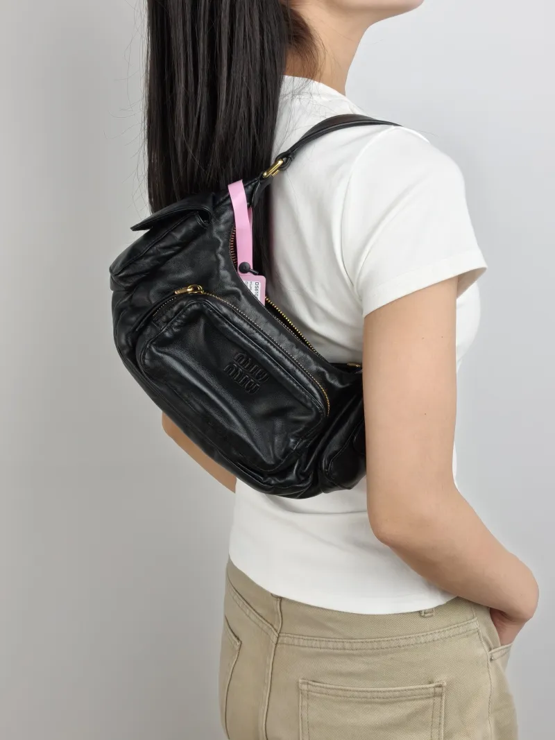 Miumiu Shoulder Bag Pocket Black SL ambskin Small 21 × 6 × 12 cm — on-model view 1 of 2