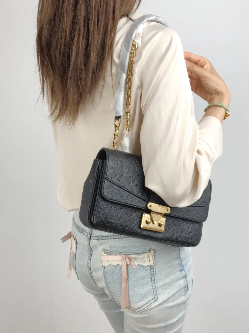 Louis Vuitton Crossbody Bag Marceau Chain Bag Black Monogram Empreinte Embossed Calfskin 24.5 × 6.5 × 15 cm — on-model view 2 of 2