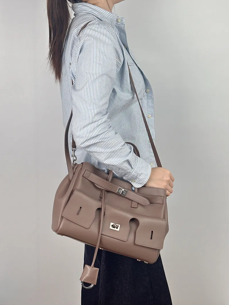 BALENCIAGA Top Handle Bag Bel air Calfskin Small 30 × 12 × 20.5 cm — on-model view 1 of 3