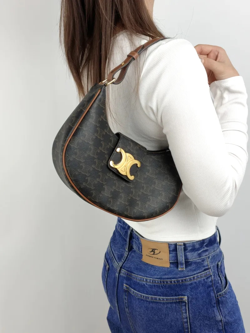 CELINE Shoulder Bag AVA TRIOMPHE Monogram PVC Medium 22 × 7.5 × 17 cm — on-model view 2 of 2