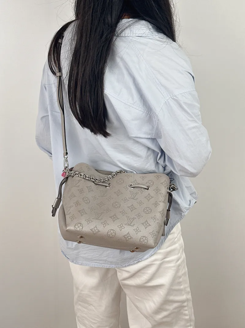 Louis Vuitton Crossbody Bag BELLA Grey Calfskin One Size 22 × 14 × 19 cm — on-model view 2 of 2