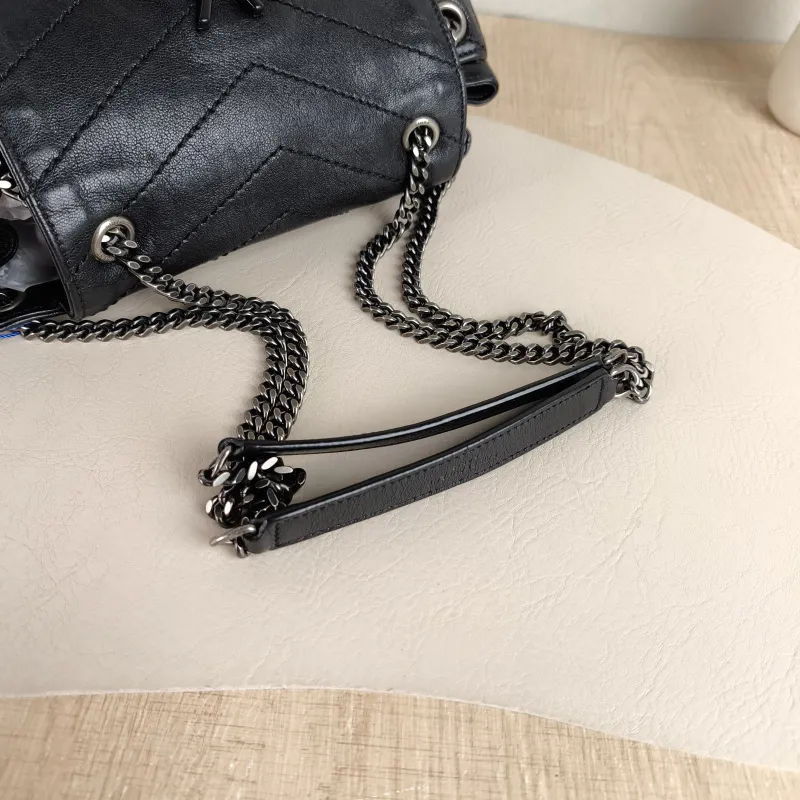 SAINT LAURENT Crossbody Bag NOLITA Black Lambskin Small 22 × 13 × 17.5 cm — detail view 5 of 11