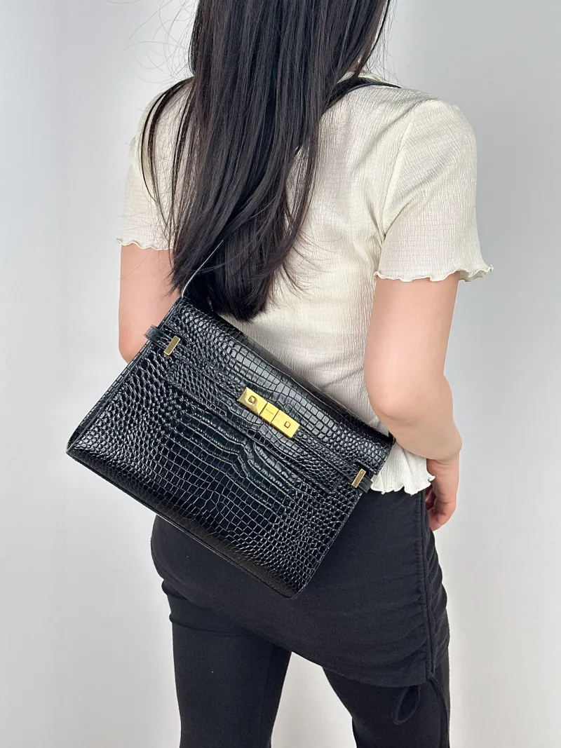 SAINT LAURENT Shoulder Bag MANHATTAN Black Calfskin Medium29 × 7.5 × 20 cm — on-model view 1 of 2