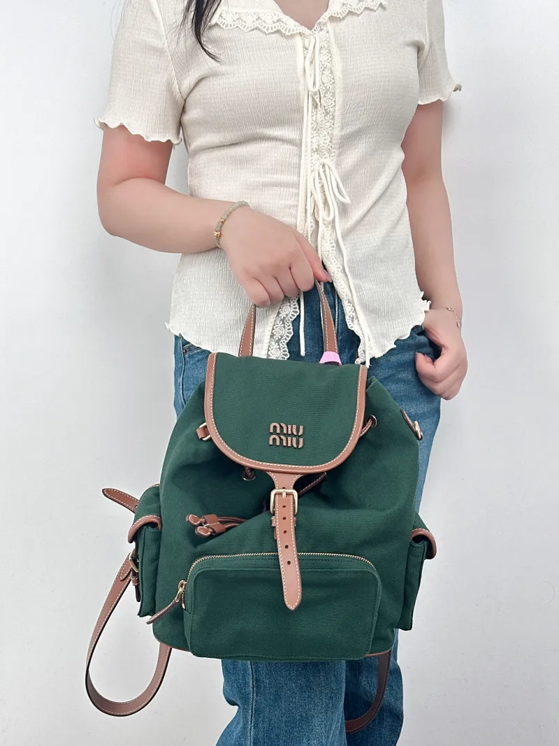 Miumiu Backpack Backpack Green Canvas Large25 × 14 × 25 cm — on-model view 3 of 3