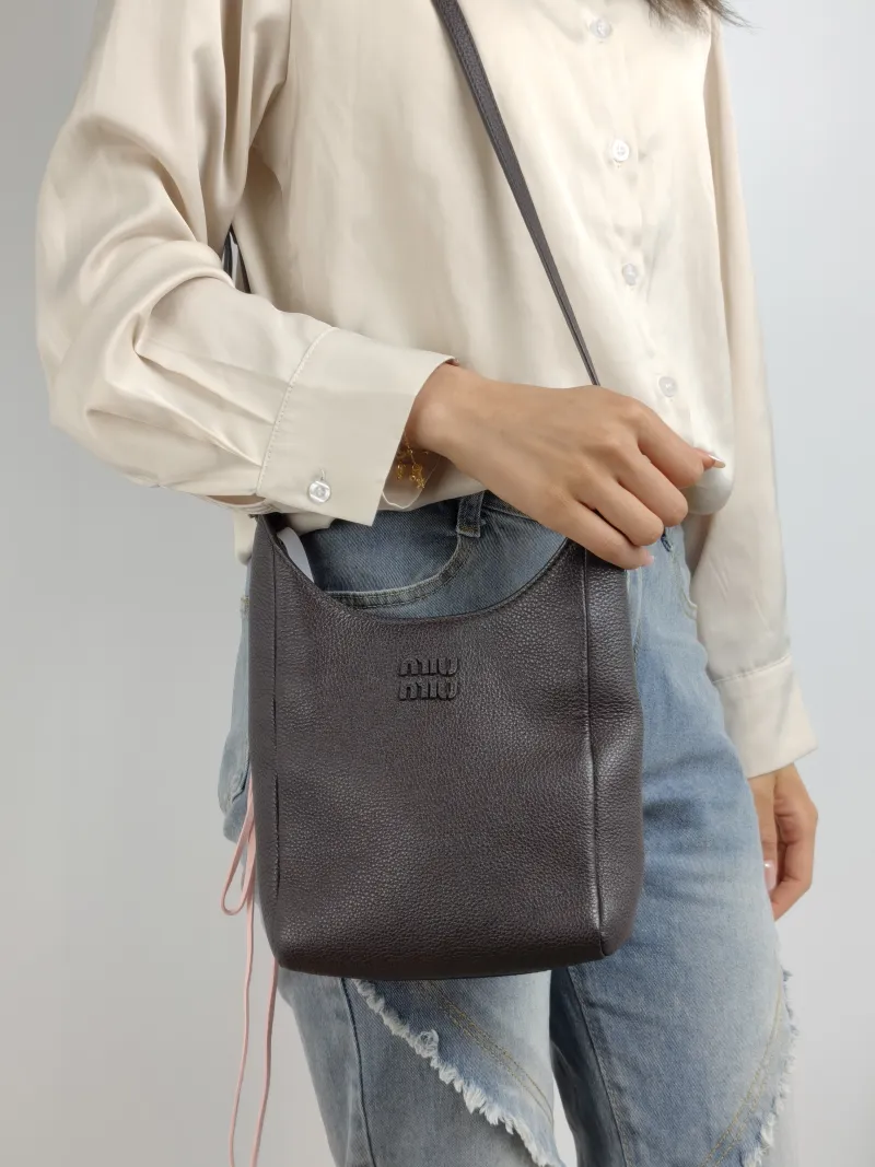 Miumiu Crossbody Bag logo Brown Calfskin One Size 16 × 7 × 17 cm — on-model view 1 of 2