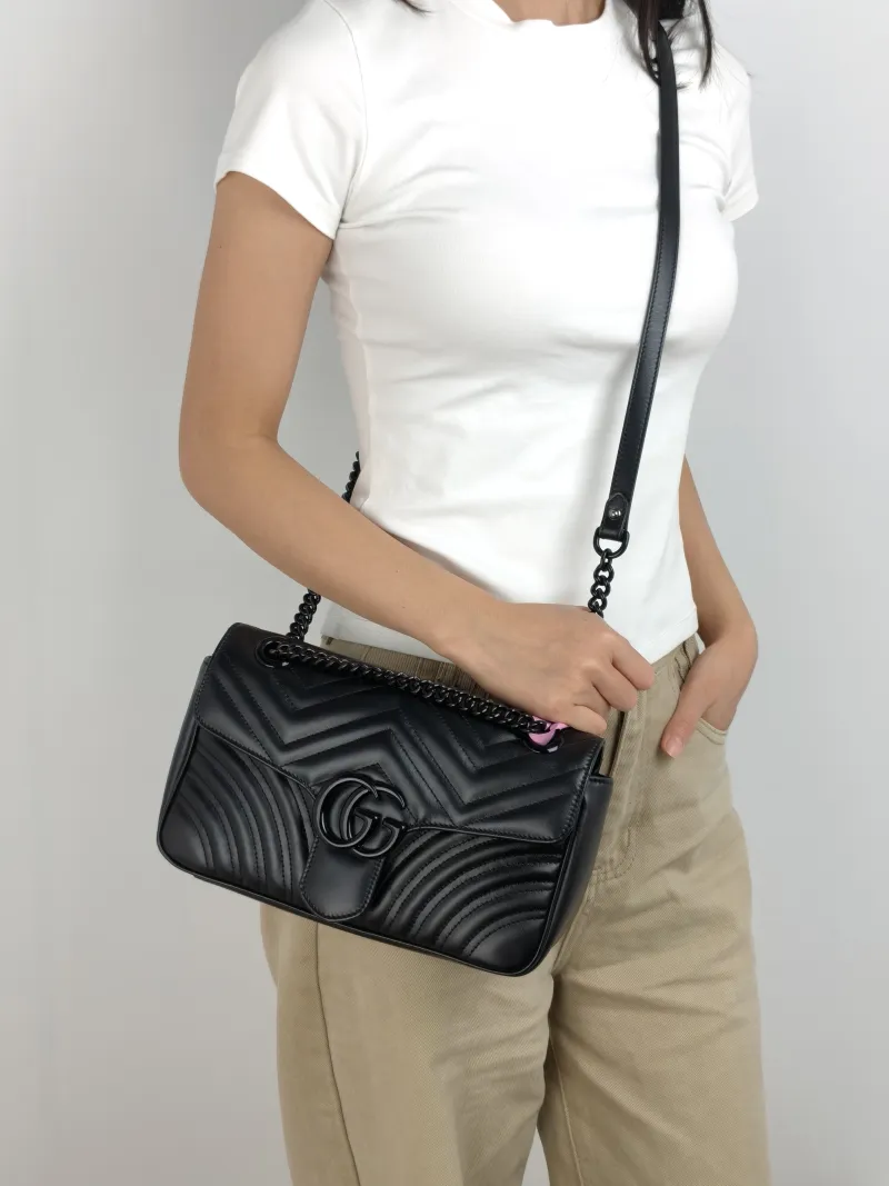 GUCCI Crossbody Bag GG Marmont Medium Marmont 26 So black Black Calfskin Medium 26 × 7 × 15 cm — on-model view 1 of 2