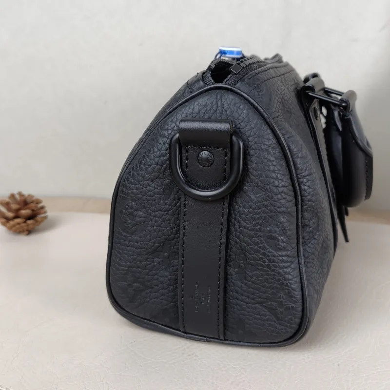 Louis Vuitton Crossbody Bag Keepall 25 Taurillon Monogram Embossed Calfskin Medium 25 × 11 × 15 cm — detail view 8 of 11