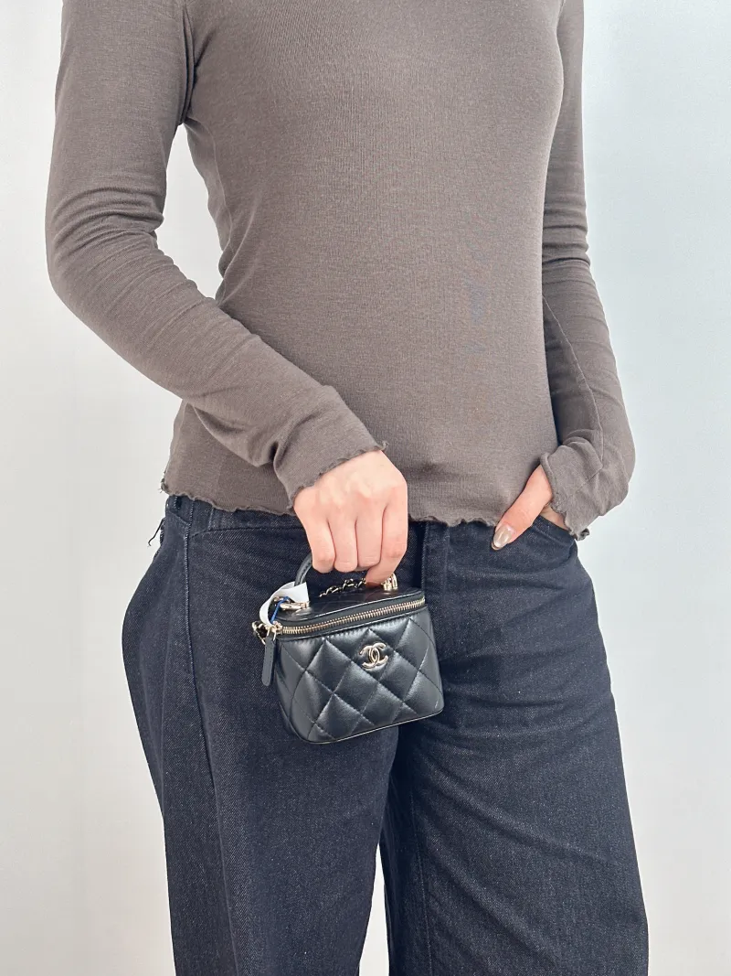 Chanel Crossbody Bag Edition Black Lambskin11 × 7 × 9 cm — on-model view 1 of 3