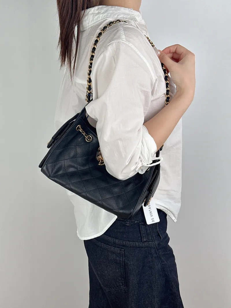 Chanel Shoulder Bag25Bag Black Grained Calfskinmini20 × 12.5 × 22 cm — on-model view 1 of 2