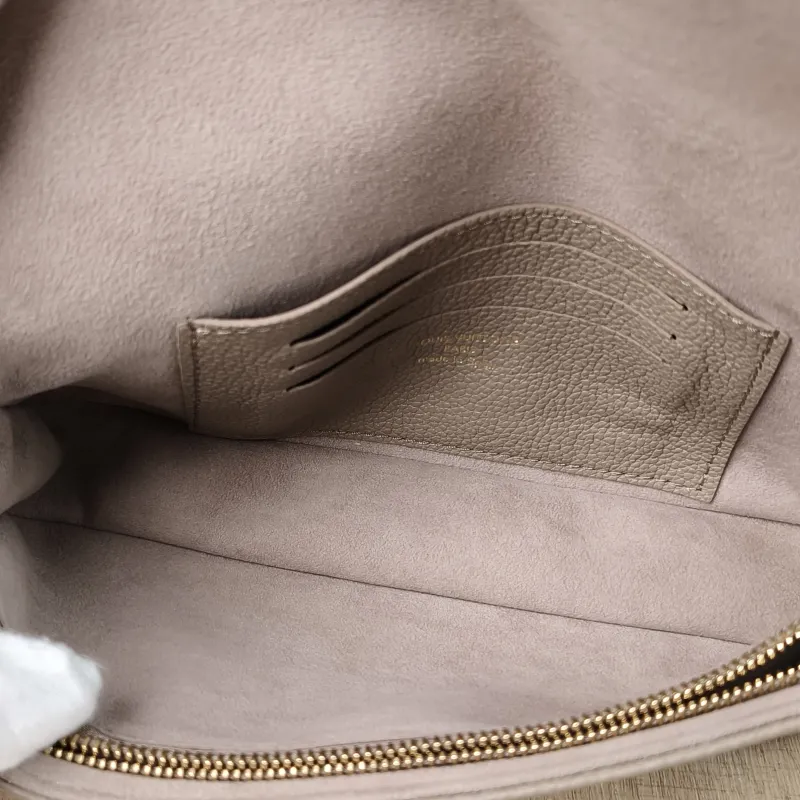 Louis Vuitton Crossbody Bag IVY Empreinte Embossed Calfskin Small 23.5 × 4.3 × 12 cm — detail view 2 of 11