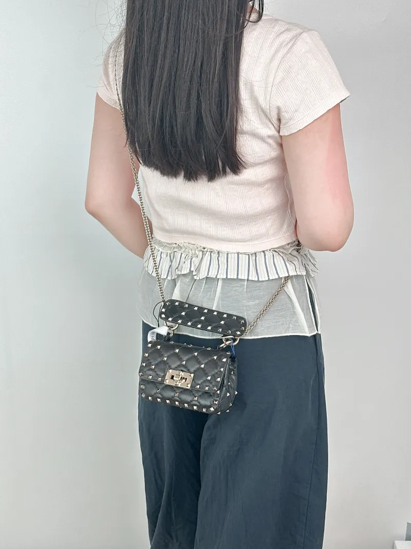 Valentino Shoulder Bag Rockstud Spike Shoulder Bag Black Lambskinmini14 × 6 × 10 cm — on-model view 1 of 2