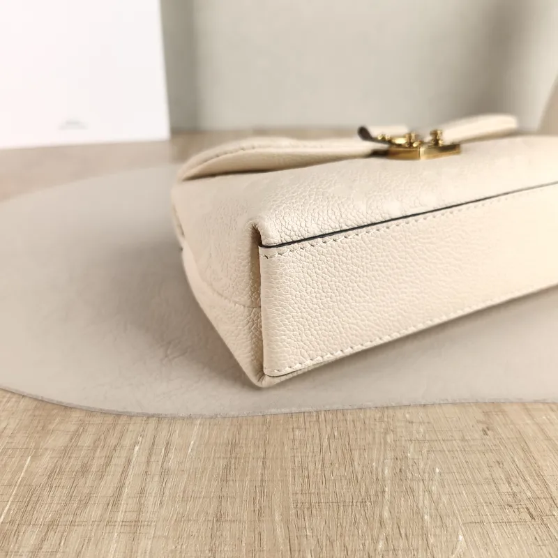 Louis Vuitton Crossbody Bag MADELEINE White Empreinte Embossed Calfskin nano 21 × 6 × 12.5 cm — detail view 2 of 11