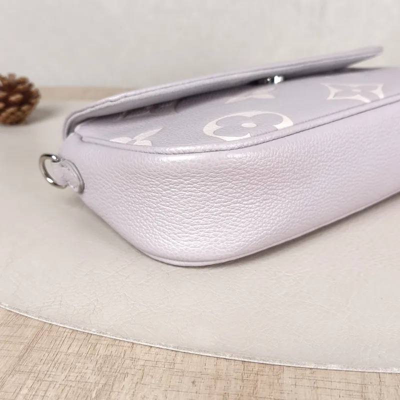 Louis Vuitton Crossbody Bag IVY Grey · White Monogram Empreinte Embossed Calfskin Small 23.5 × 4.3 × 12 cm — detail view 9 of 11