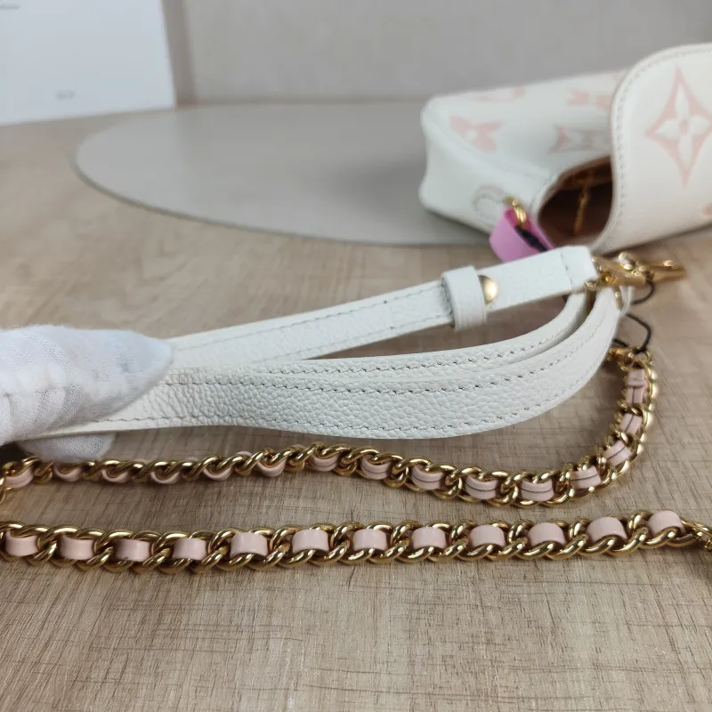 Louis Vuitton Crossbody Bag IVY White · Pink Monogram Empreinte Embossed Calfskin Small 23.5 × 4.3 × 12 cm — detail view 7 of 11