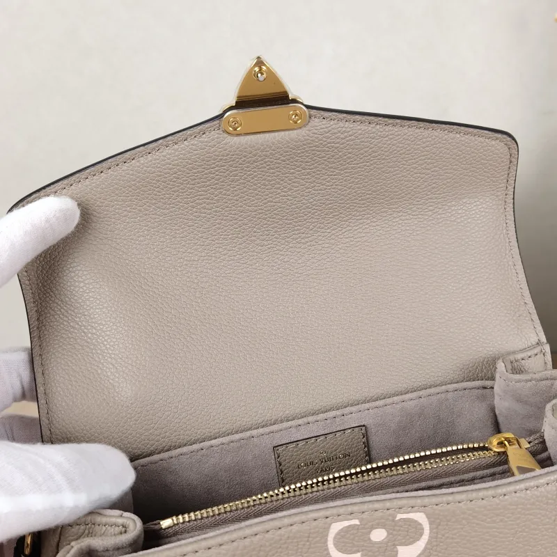 Louis Vuitton Crossbody Bag Pochette Métis East West Empreinte Embossed Calfskin Monogram Small21.5 × 6 × 13.5 cm — detail view 1 of 15