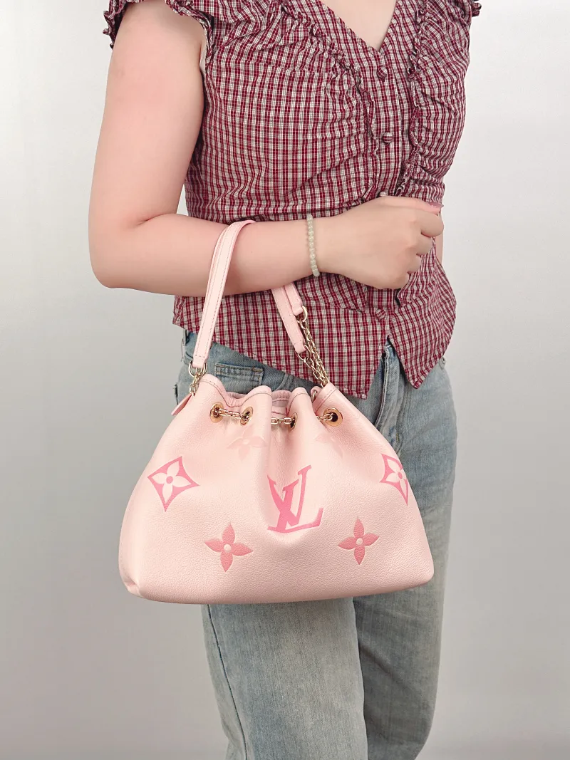 Louis Vuitton Crossbody Bag BUNDLE Pink Monogram Empreinte Embossed Calfskin28 × 11.5 × 20 cm — on-model view 4 of 4