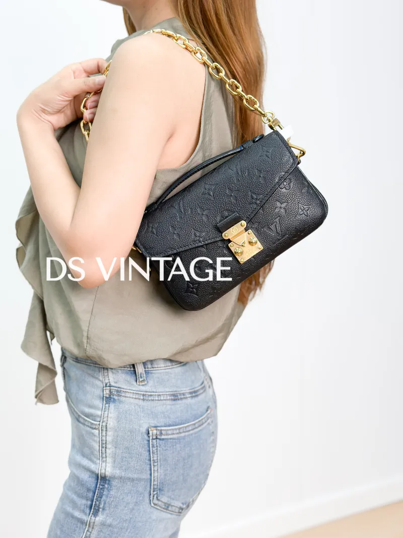 Louis Vuitton Crossbody Bag Pochette Métis East West Black Empreinte Embossed Calfskin Small 21.5 × 6 × 13.5 cm — on-model view 1 of 3