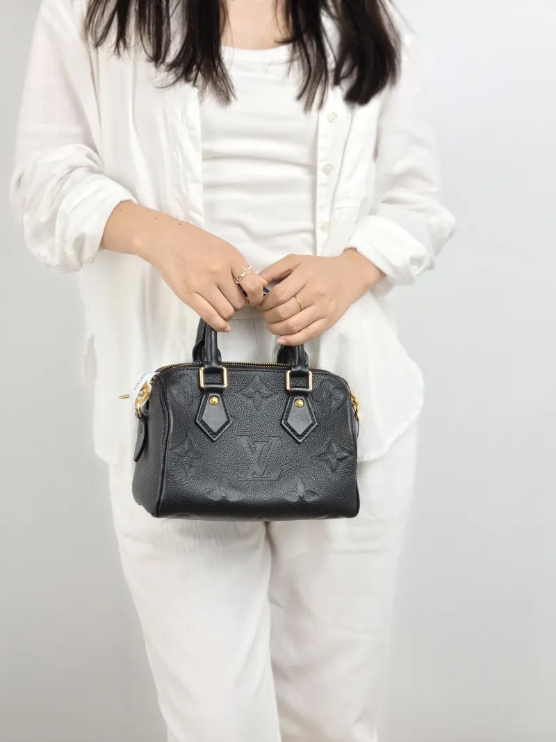 Louis Vuitton Crossbody Bag Speedy20 Black Monogram Empreinte Embossed Calfskin Small 20.5 × 12 × 13.5 cm — on-model view 1 of 2