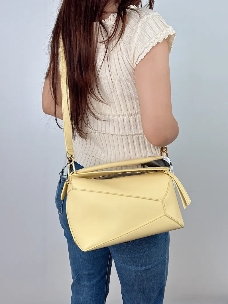 LOEWE Crossbody Bag Puzzle CC alfskin Small24 × 10.5 × 16.5 cm — on-model view 2 of 2