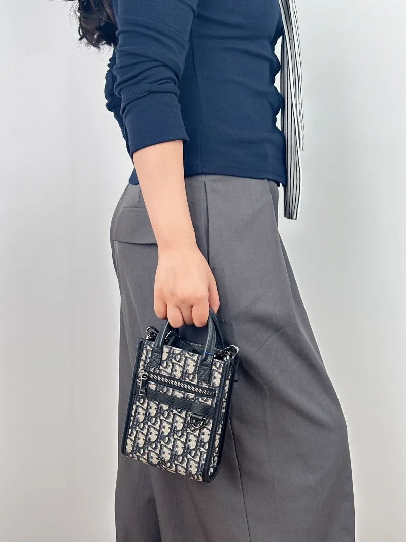 DIOR Crossbody Bag Safari North-South Beige · Black Mini 14 × 6.5 × 19 cm — on-model view 2 of 2