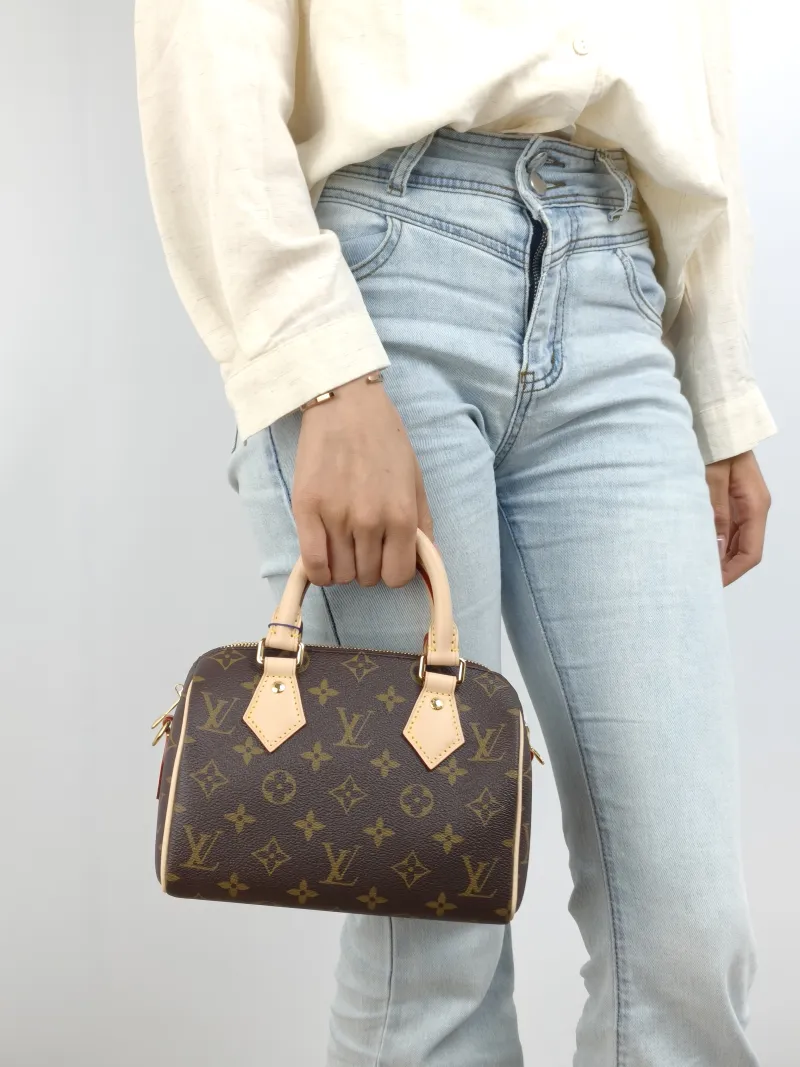 Louis Vuitton Crossbody Bag Speedy20 Shoulder Strap PVC Small 20.5 × 12 × 13.5 cm — on-model view 2 of 2