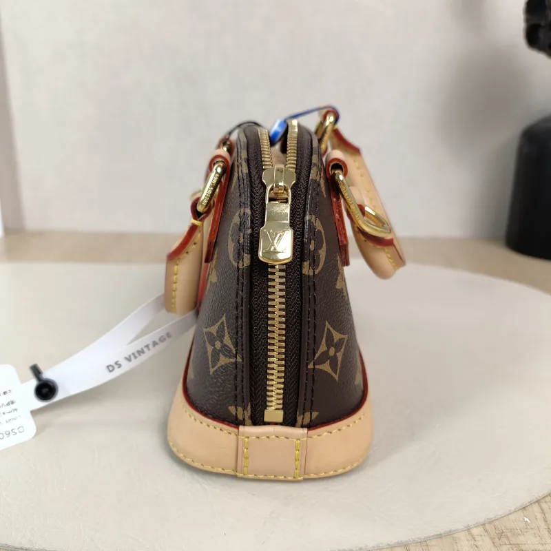 Louis Vuitton Crossbody Bag Alma Nano Monogram · PV Cnano18 × 8 × 12 cm — detail view 4 of 12