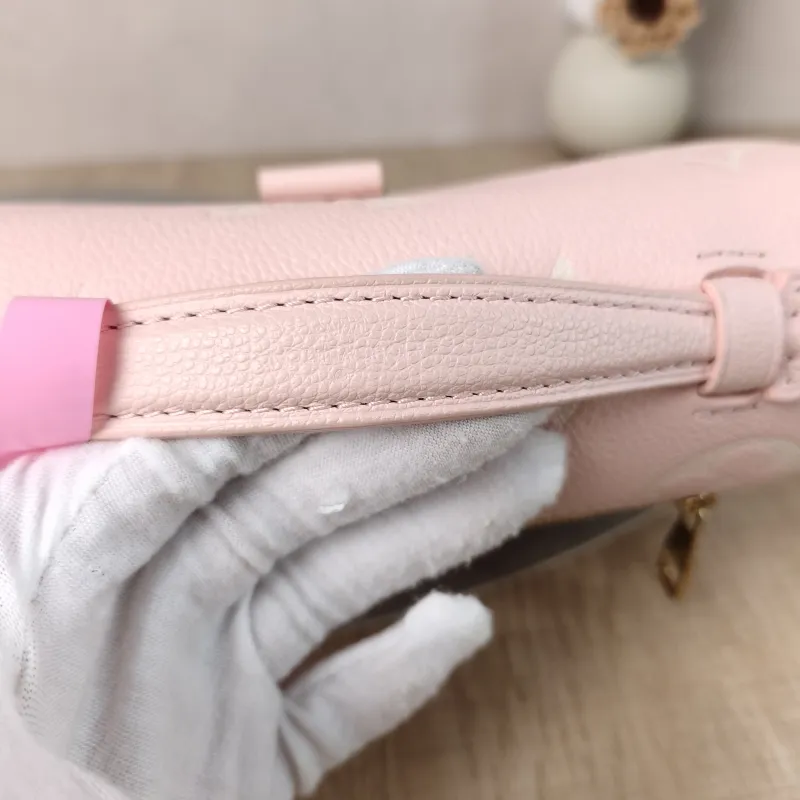 Louis Vuitton Crossbody Bag Pochette Métis East West Monogram Empreinte Embossed Calfskin Small 21.5 × 6 × 13.5 cm — detail view 11 of 14