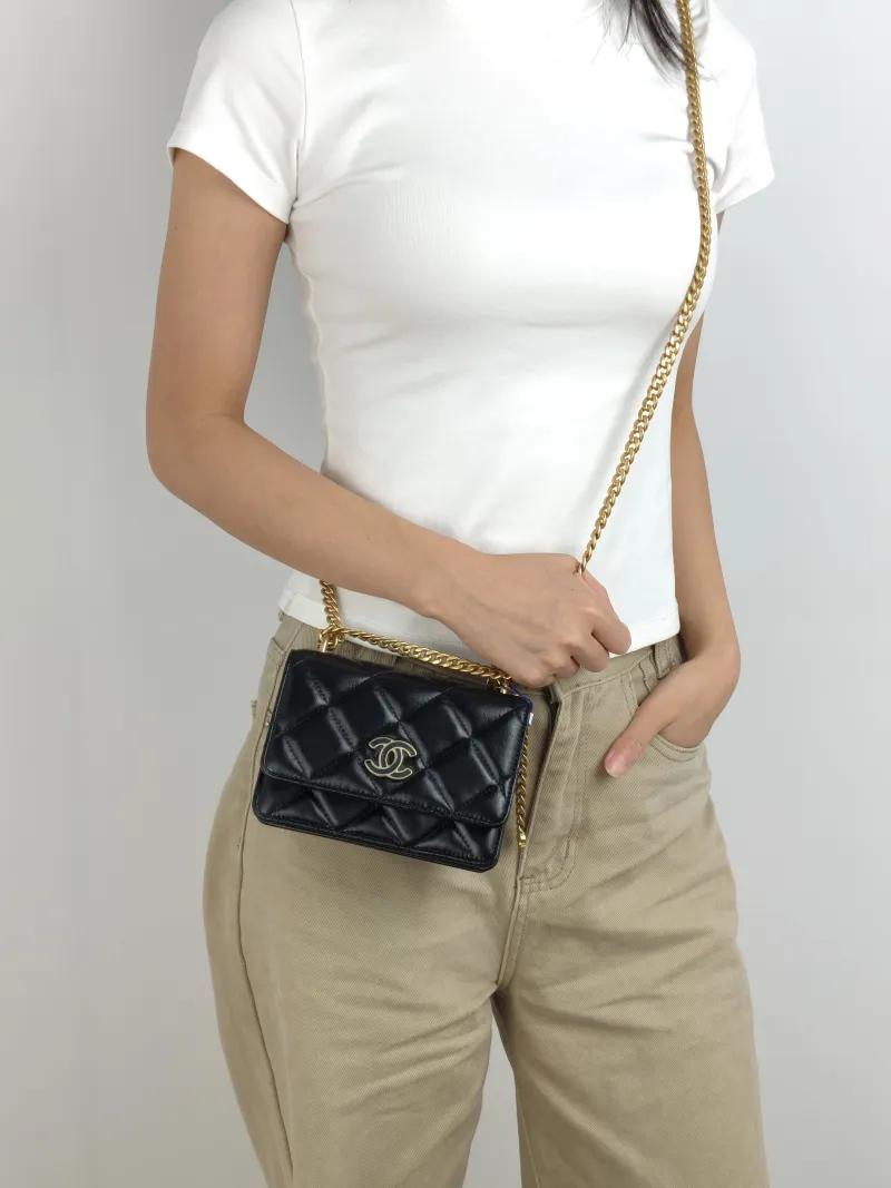 Chanel Crossbody Bag CF WOC Black Lambskin Mini 15 × 5 × 10 cm 31 — on-model view 1 of 3
