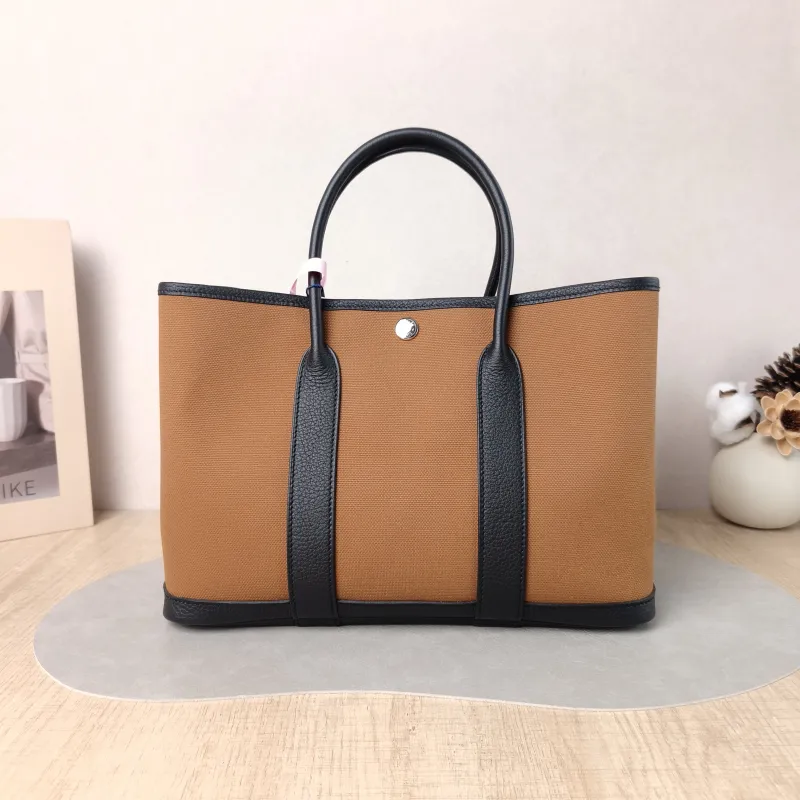 Hermès Top Handle Bag Garden Party 30 30 Brown Canvas · Negonda Calfskin Medium 30 × 13 × 21 cm B — cover view 4 of 5