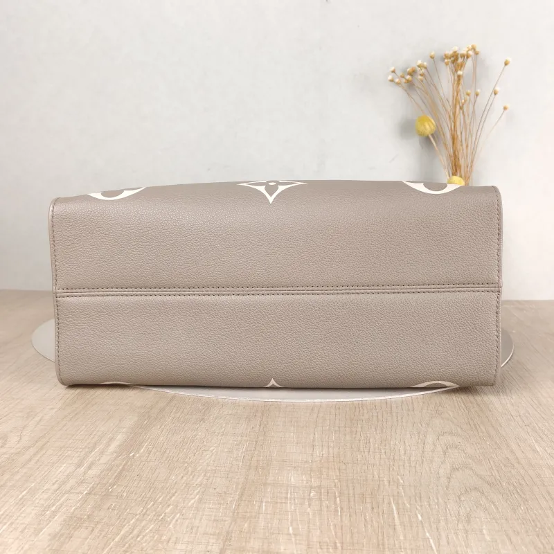 Louis Vuitton Shoulder Bag Onthego Medium · White Monogram Empreinte Embossed Calfskin Medium 35 × 14 × 27 cm — cover view 3 of 5