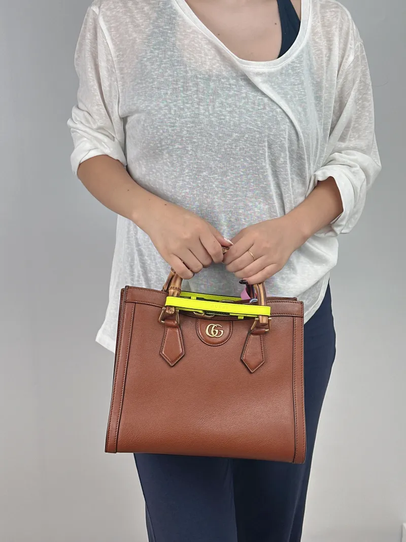 GUCCI Top Handle Bag Diana Top Handle Bag Caramel Calfskin Medium 27 × 10 × 24 cm — on-model view 2 of 2