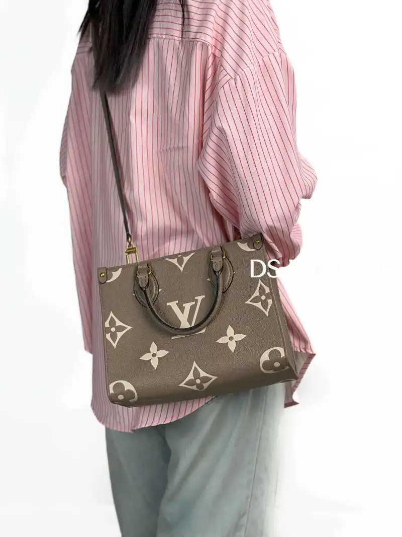 Louis Vuitton Shoulder Bag Onthego · White Empreinte Embossed Calfskin Small25 × 11.5 × 19 cm — on-model view 2 of 3